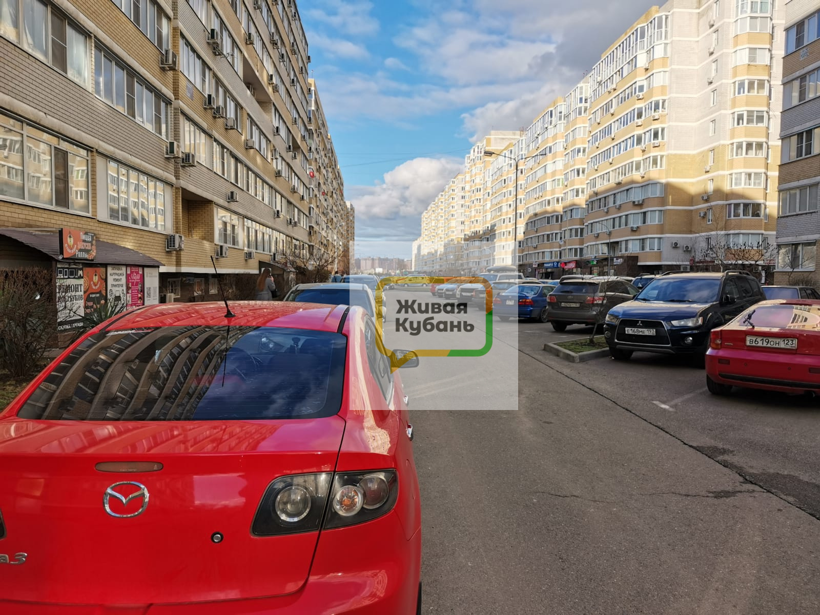 город