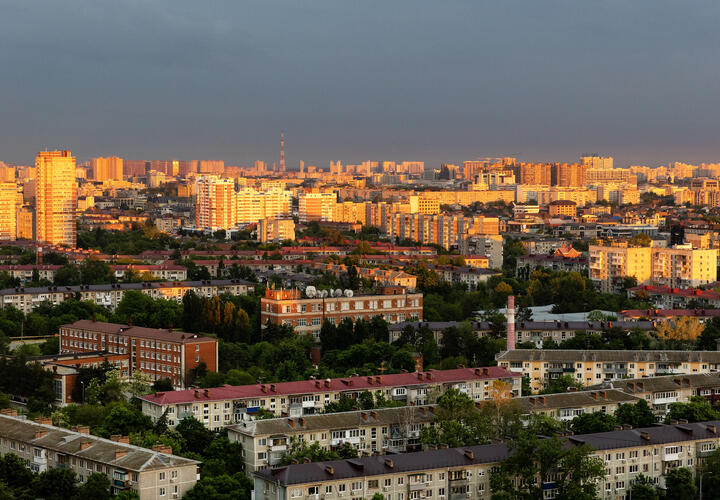 город