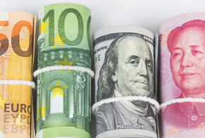 Курс евро Московской бирже вырос, а доллар чуток упал