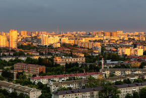 город