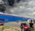 Стервятники: люди выносили продукты из обгоревшего магазина в Краснодаре