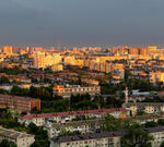город